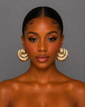 Gold pleated metal earrings